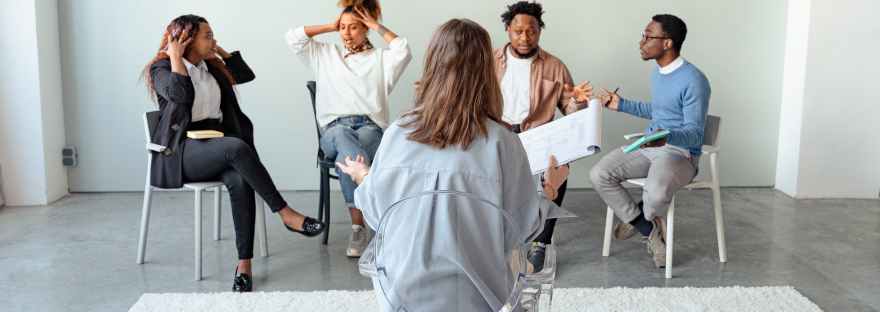 people in a psychotherapy session