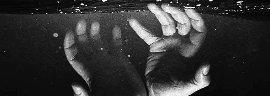 persons feet on water